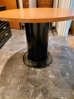 Round wooden table with black metal base like new