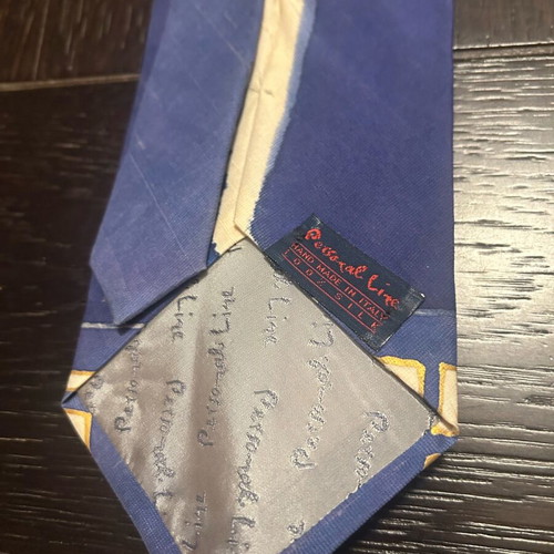 Vintage Personal Line tie like new with ancient designs