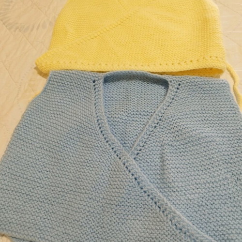 Handmade knitted baby sleeveless cardigans, yellow and blue