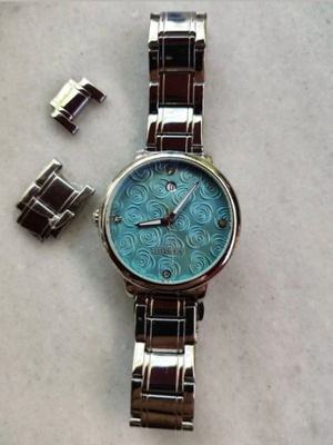 Vogue Floral Women's Watch with Silver Metal Bracelet like new