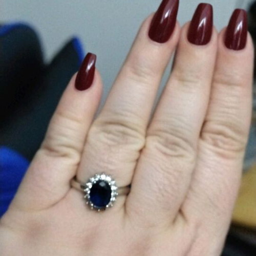 Women's ring with blue stone like new, size 8