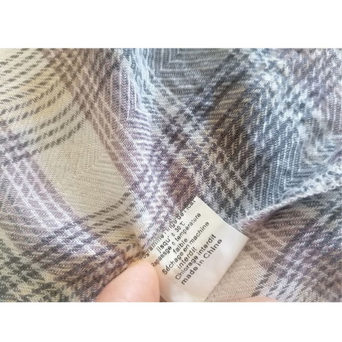 Cherry Paris poncho with checkered pattern and white tassels like new