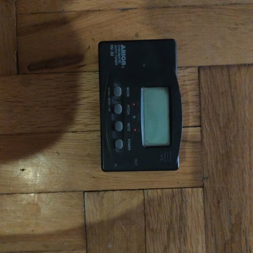 Electronic tuner for string instruments like new