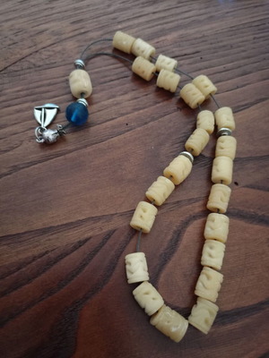 Worry beads used, carved camel bone collectible