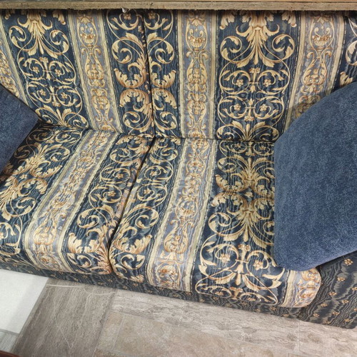 Two-seater sofa with storage compartment