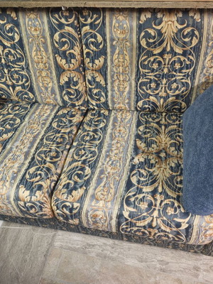 Two-seater sofa with storage compartment