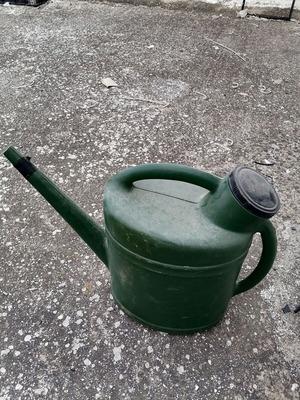 Plastic watering can retro used