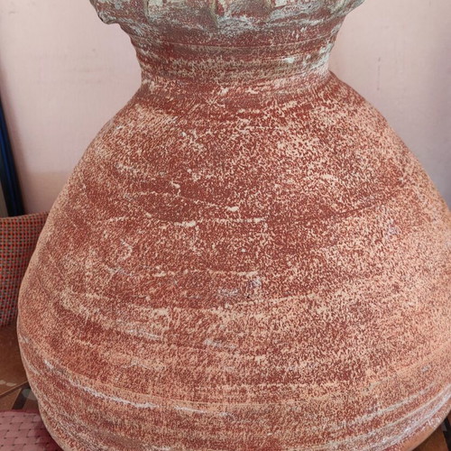 Clay flowerpot used with crack at base