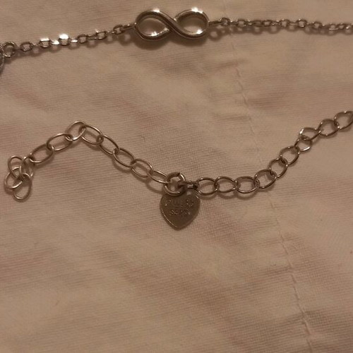 Silver bracelet with stones and infinity symbol like new