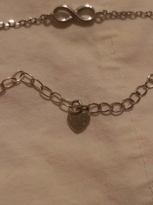 Silver bracelet with stones and infinity symbol like new