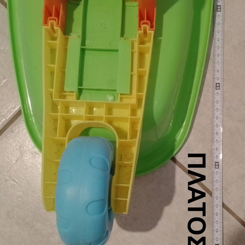 Beach toy set: plastic wheelbarrow, shovel, rake, small excavator