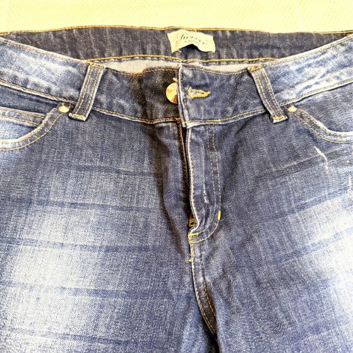 Vintage blue Rococo jeans with studs and rips like new