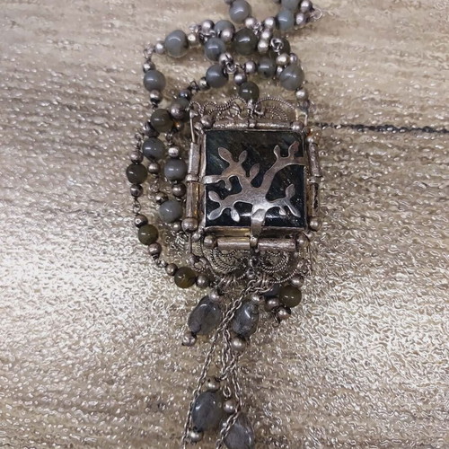 Nougat handmade necklace like new with filigree silver pendant