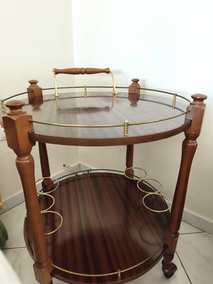 Vintage wooden bar cart with wheels