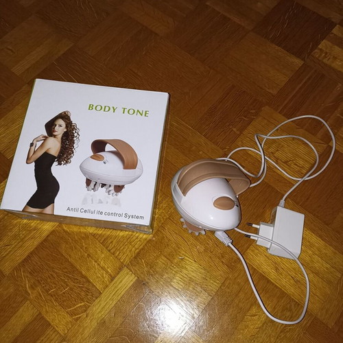 Body Tone massage machine like new with charger and cable