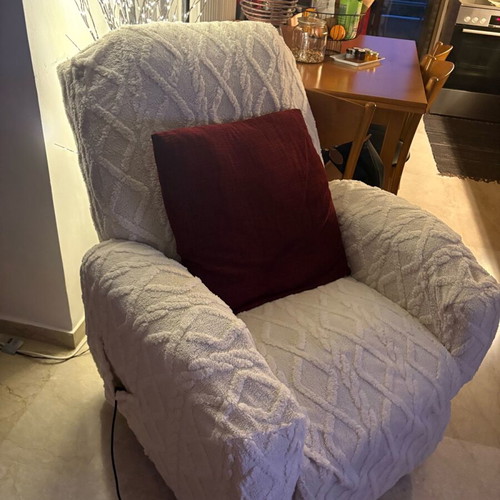 Electric ergonomic armchair used with cover