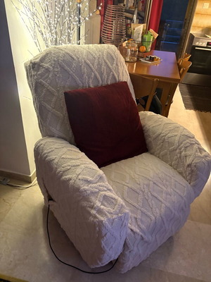 Electric ergonomic armchair used with cover