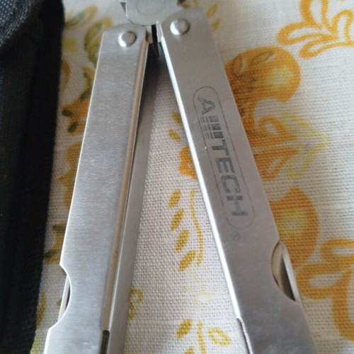 Multitool with gift pocket knife like new