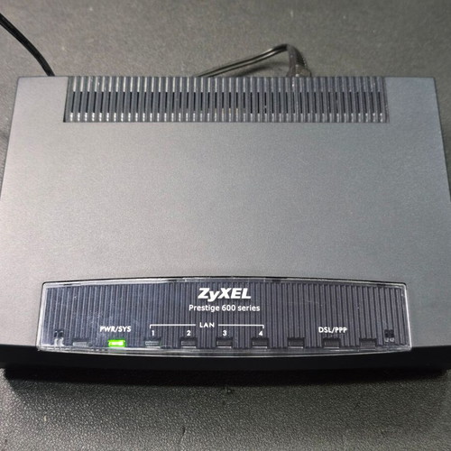ZyXEL Prestige 660H-63 ADSL2+ 4-Port Gateway router used with power supply