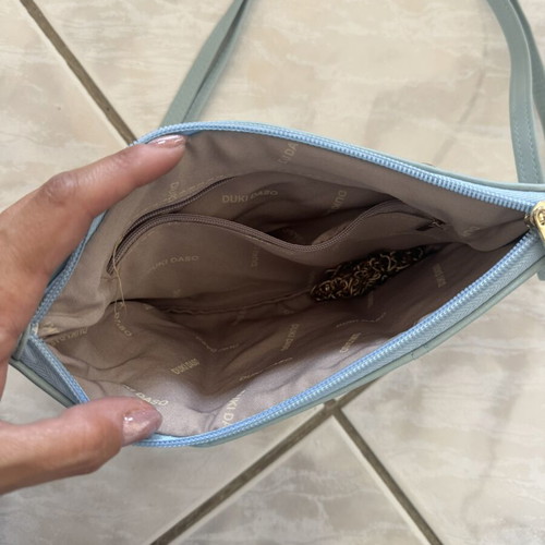 Duki Daso shoulder bag turquoise like new