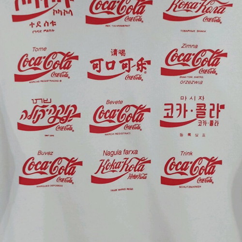 H&M women's sweatshirt with Coca Cola logo size small like new, white