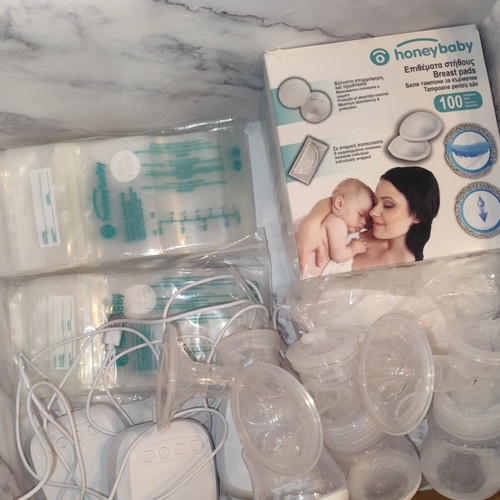 Breastfeeding set with pumps and accessories like new