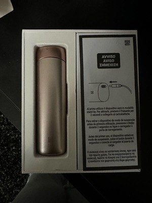 Solid IQOS device used with wear