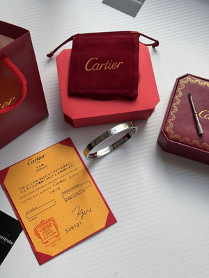 Cartier bracelet new with certificates and boxes