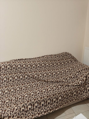 Sofa throw used with small hole