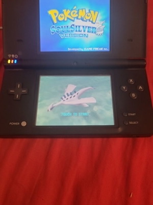 Nintendo DSi XL black with Pokemon SoulSilver used in very good condition