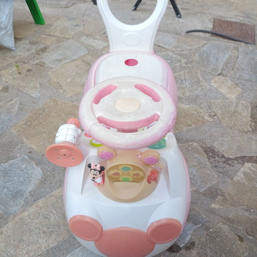 Baby pink ride on car used, slight sun fading