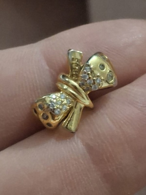 Charm bow gold with zircon stones s925 used