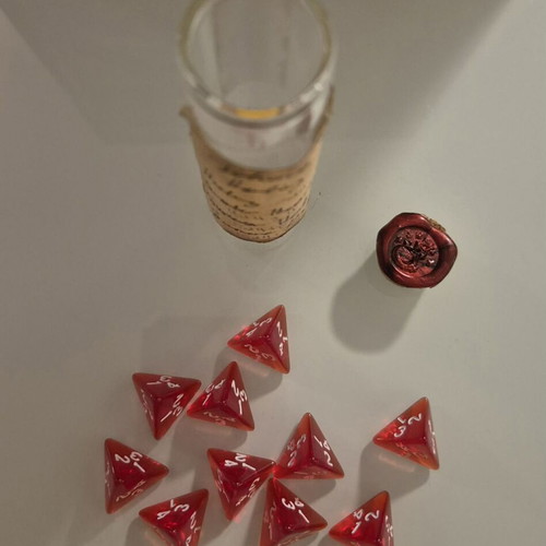 DnD healing potion bottle with 10 red tetrahedral dice