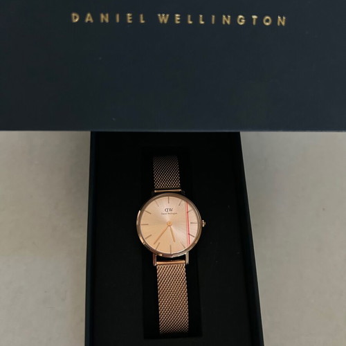 Daniel Wellington Petite Unitone watch with rose gold metal bracelet