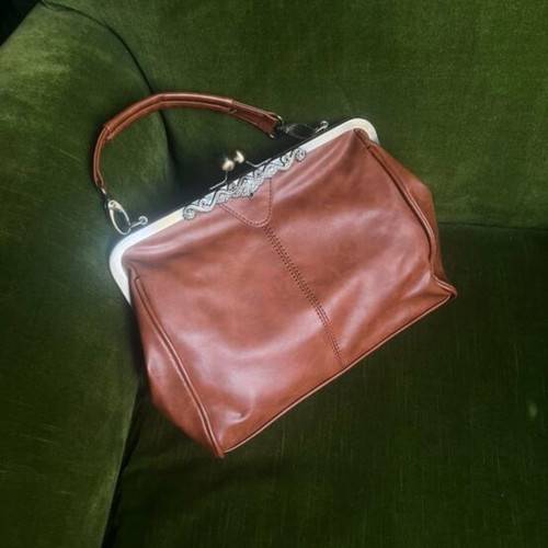 Vintage leather handbag like new, brown with bronze details