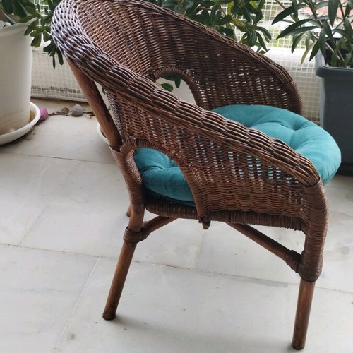 Bamboo children's armchair like new with petrol and red cushions