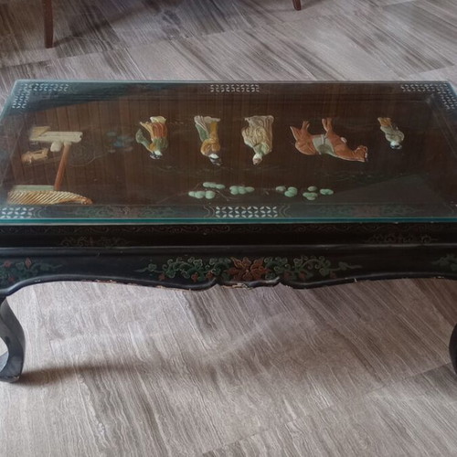 Carved table with folding legs used, traditional Chinese design