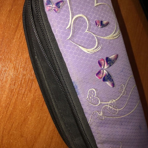 Polo pencil case used with slight ink on lid