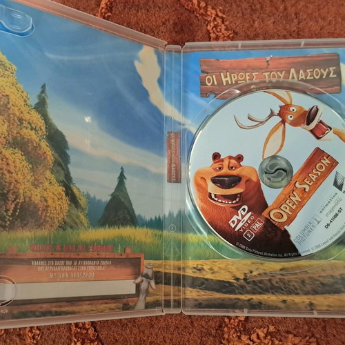 Surf's Up and Open Season DVD used, animated movies