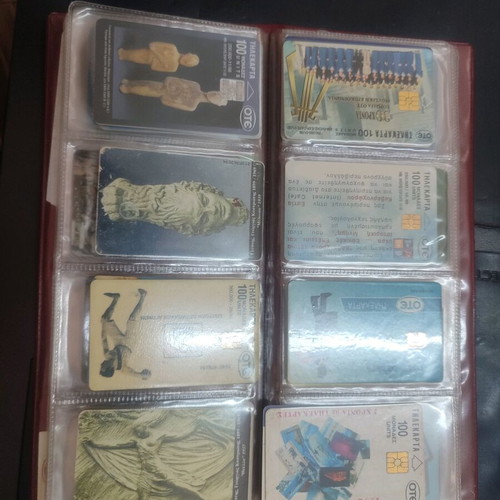 Phone cards used, album with 66 pieces