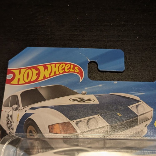 Hot Wheels collection with 4 Ferraris and Porsche 911 R Chase, new and sealed