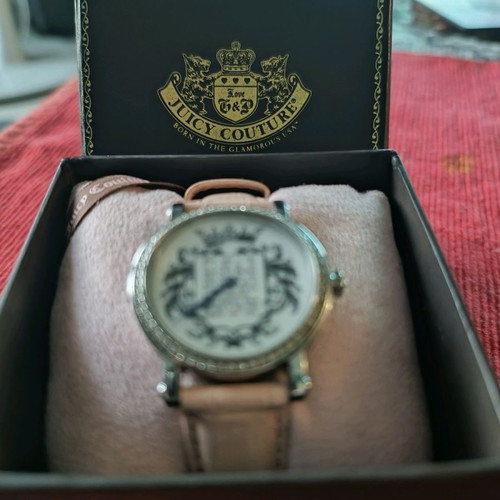 Juicy Couture wristwatch used with Swarovski stones