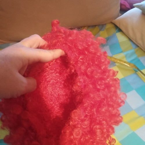 Orange carnival wig used with curly hair