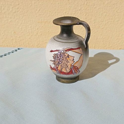 Small amphora new, black color with design and one handle