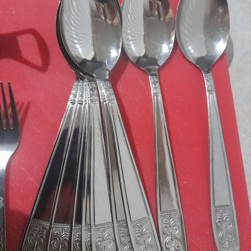 Cutlery set 24 pieces like new with coasters and opener
