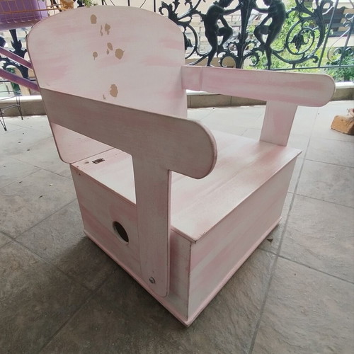 Wooden children's chair with storage used