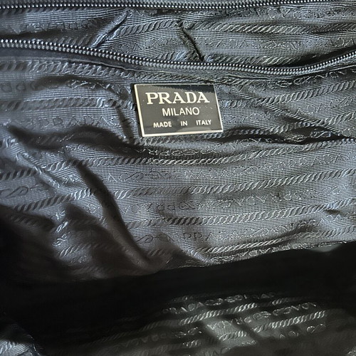 Prada travel bag like new, large black with handles and shoulder strap