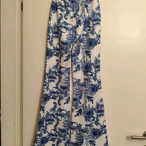 Coocu printed pants like new, slim fit with elastic waist