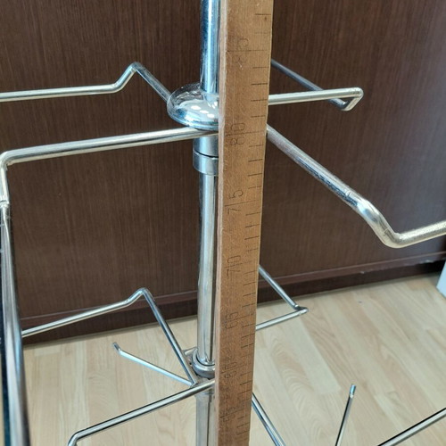 Metal three-tier countertop stand used with wooden base