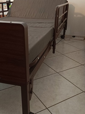 Electric hospital bed used, adjustable height with remote control
